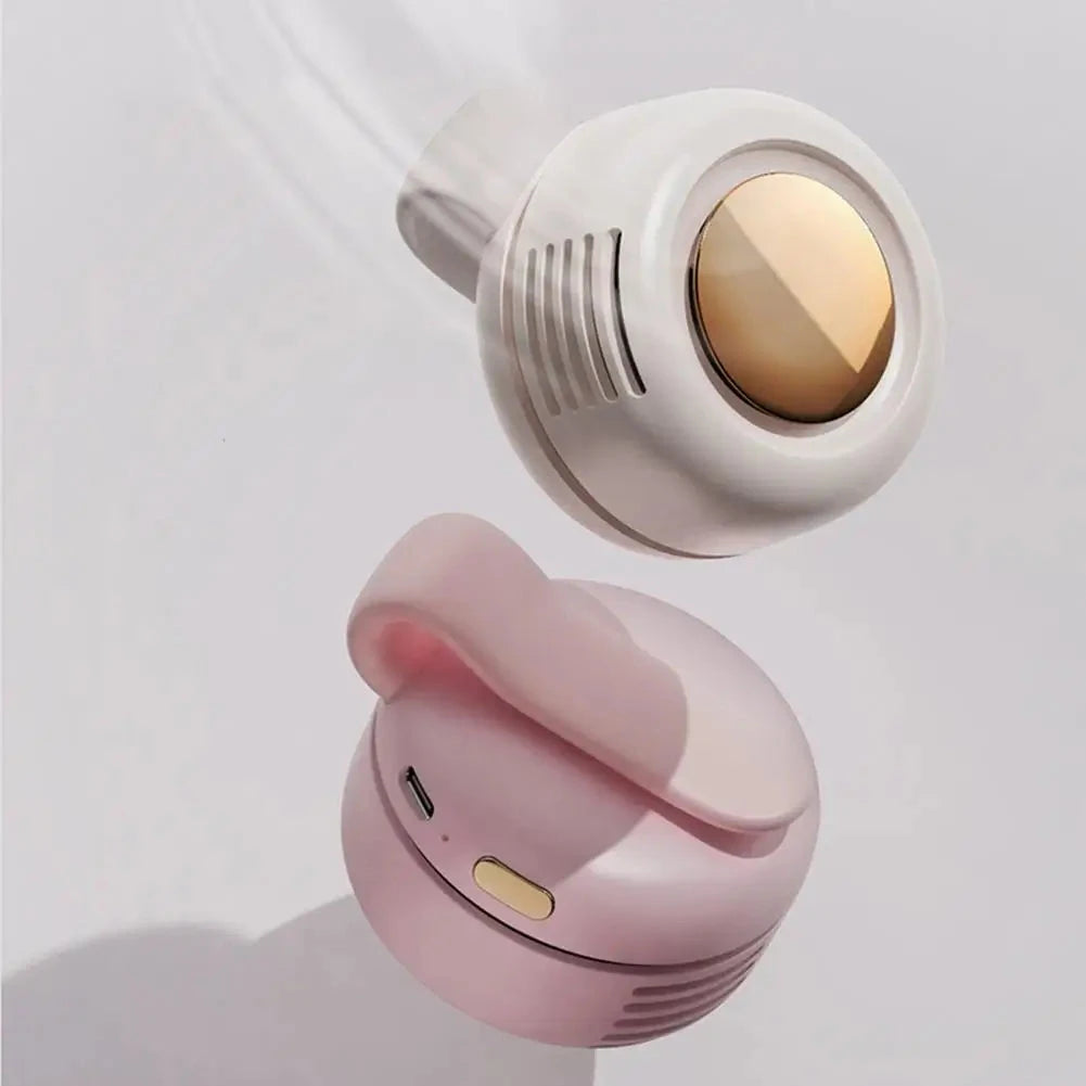 Pink and white fans with gold accents on a light gray background